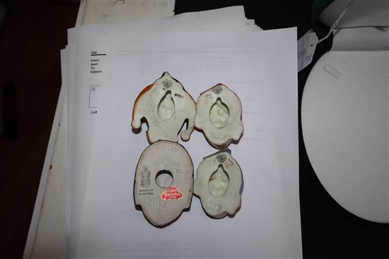 An Austrian miniature lady face mask and three Doulton miniature face masks